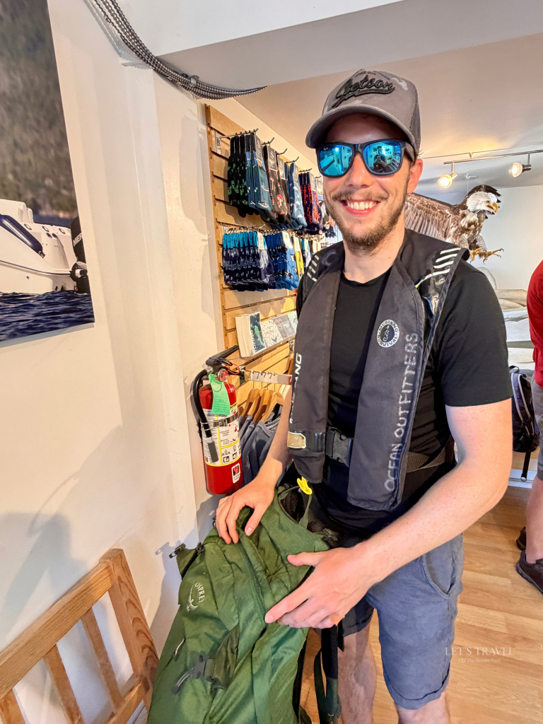 Man preparing for a tour to watch sea otters in Tofino on Vancouver Island, Canada.